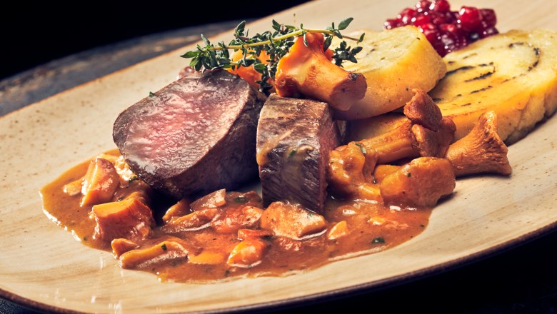 Saddle of venison, chanterelle sauce, potato and herb roulade, © Niederösterreich Werbung/Andreas Hofer Saddle of venison, chanterelle sauce, potato and herb roulade, © Niederösterreich Werbung/Andreas Hofer