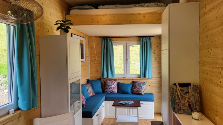 Living area with fold-down bed, © Villa to go Living area with fold-down bed, © Villa to go