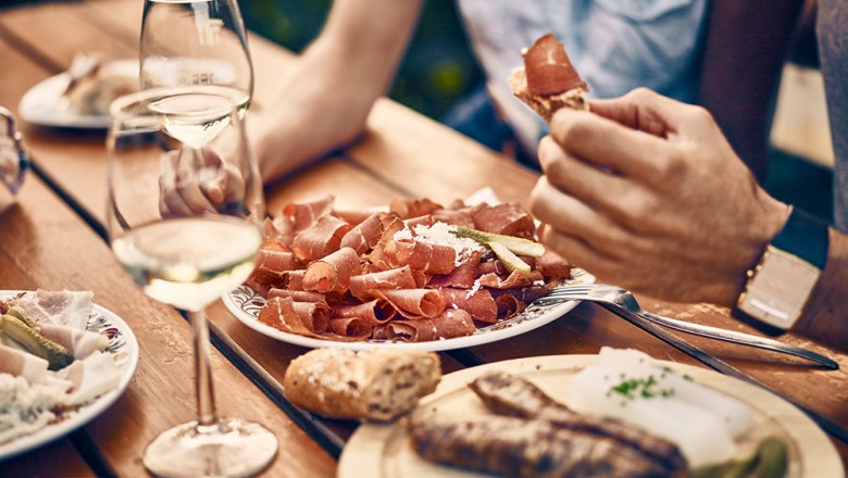 Enjoy culinary delights at a wine tavern, &copy; Andreas Hofer