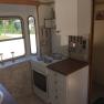 Small cooking facilities with electric stove in the kitchen of the 100-year-old luggage van, &copy; M. Schorn