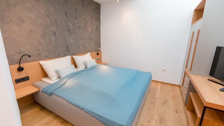 H&aacute;l&oacute;szoba a t&oacute;parti h&aacute;zban, &copy; schwarz-koenig.at